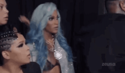 Three Blue-Haired Women Standing In Room GIF