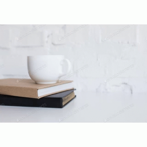 Three Books Are Stacked On Top Of Each Other On A White Surface . GIF