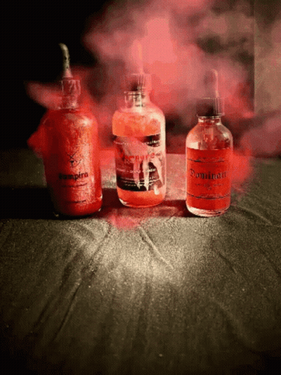 Three Bottles Of Liquid One Of Which Is Called Vampire GIF