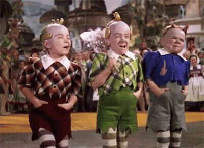 Three Boys In Costumes Before Crowd GIF