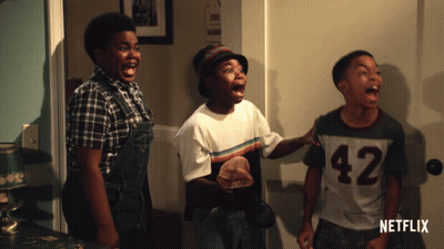 Three Boys Standing In Front Of Netflix Door GIF