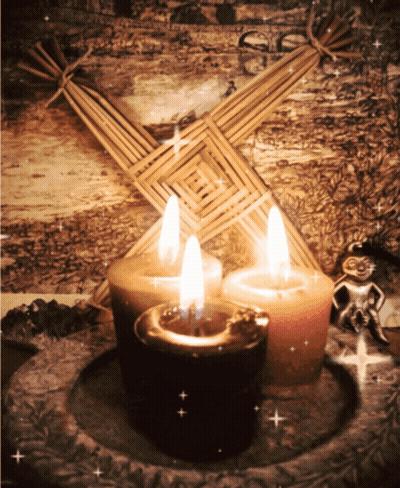 Three Candles In Front Of Straw Cross GIF