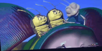Three Cartoon Bugs Are Sitting On Top Of A Green Object GIF