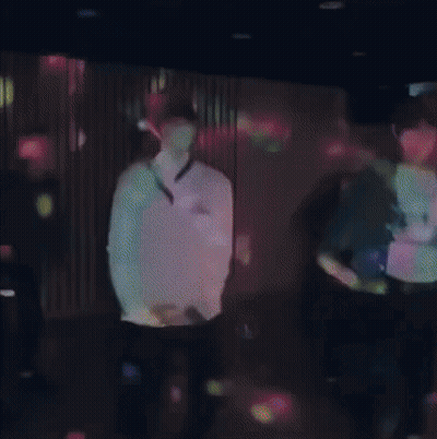 Three Cartoon Characters Dancing In Flower Crowns GIF