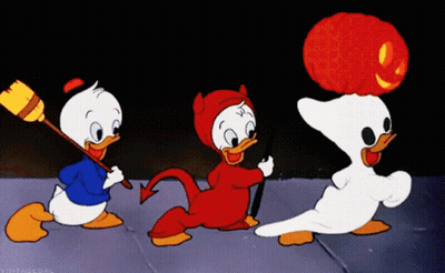 Three Cartoon Ducks In Halloween Costumes GIF