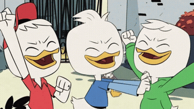 Three Cartoon Ducks Standing Together GIF