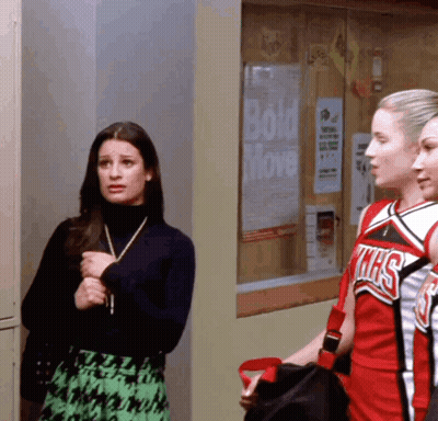 Three Cheerleaders In Front Of Bulletin Board With Bold Move Poster GIF