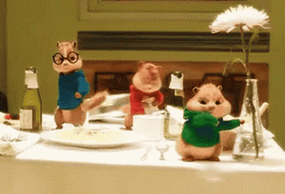 Three Chipmunks With Vase Of Flowers And Wine Bottle GIF