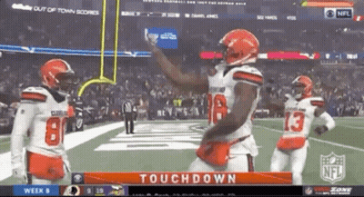 Three Cleveland Browns Players Celebrating Touchdown GIF