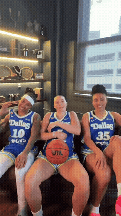 Three Dallas Basketball Players Sitting On Bench GIF