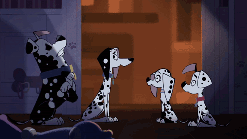 Three Dalmatian Dogs Are Standing Next To Each Other In A Dark Room GIF