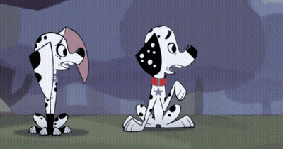 Three Dalmatian Dogs With One Having A Red White Blue Star On Collar GIF