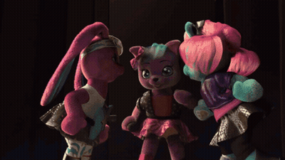 Three Dolls Are Standing On A Stage And One Of Them Has A Skull On Her Shoe GIF