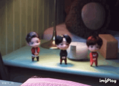 Three Dolls Are Standing On A Table With Imgplay Written In The Corner GIF