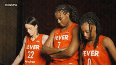 Three Female Basketball Players Wearing Red Uniforms With Fever Written On Them GIF