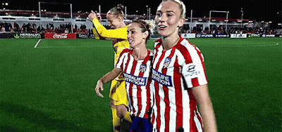 Three Female Soccer Players Wearing Red And White Striped Jerseys With Herbalife Nutrition Written On The Front GIF