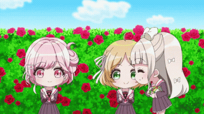 Three Girls Are Standing In Front Of A Field Of Roses GIF