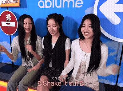 Three Girls In Front Of Ablume Sign GIF