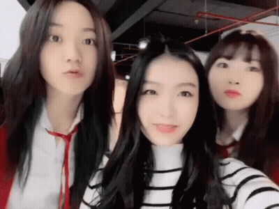 Three Girls Posing Together One Wearing Tie GIF