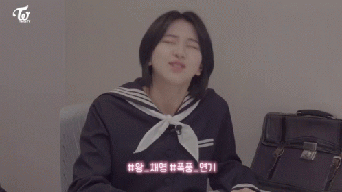 Three Girls Sitting At Table With Korean Writing GIF