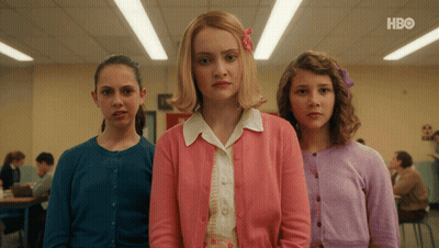 Three Girls Standing Next To HBO GIF