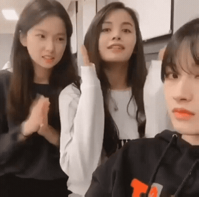 Three Girls Standing With Hoodie Letter T GIF
