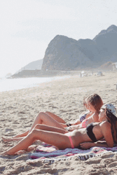Three Girls Tanning On The Beach GIF