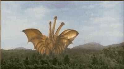 Three-Headed Golden Dragon Flying Over Field GIF