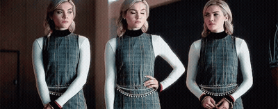 Three Images Of Woman In Plaid Dress GIF