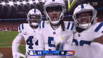 Three Indianapolis Colts Players Celebrate A Touchdown Against Broncos GIF