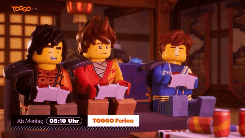 Three Lego Figures At Toggo Ferien Sign GIF