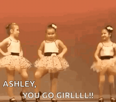 Three Little Girls Are Dancing On A Stage And One Of Them Is Saying `` Ashley , You Go Girl ! '' GIF