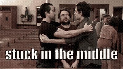 Three Men Are Hugging Each Other In A Church With The Words Stuck In The Middle Above Them . GIF