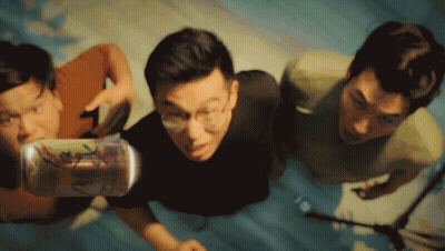 Three Men Are Looking Up At A Can That Says ' A ' On It GIF