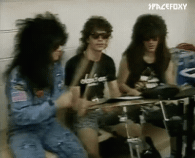 Three Men Are Playing Drums In A Room With Spacefoxy Written On The Bottom Right GIF