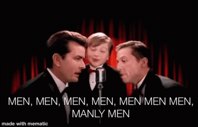 Three Men Are Singing Into Microphones In Front Of A Red Curtain With The Words Men Men Men Men Men Manly Men Written On GIF