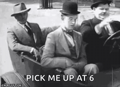 Three Men Are Sitting In A Car And One Of Them Is Wearing A Hat . GIF
