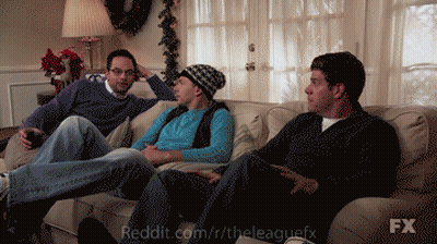 Three Men Are Sitting On A Couch With Reddit.com/r/theleaguefx In The Upper Right Corner GIF
