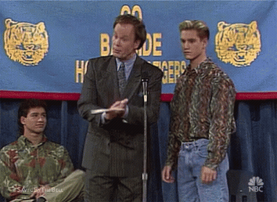Three Men At Microphone With Tigers Banner GIF