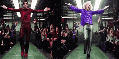Three Men Dancing In Front Of Crowd GIF
