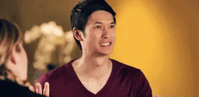 Three Men High Five In Front Of Blue Sky GIF