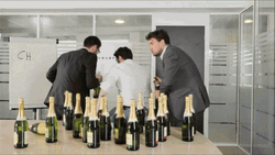 Three Men Holding A Champagne Bottle GIF