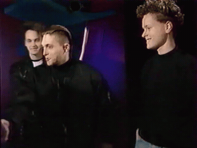 Three Men Holding Gold Record GIF