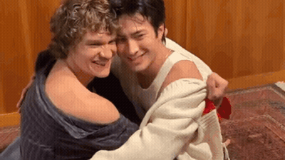 Three Men Hugging GIF