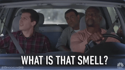 Three Men In A Car With The Words " What Is That Smell " On The Screen GIF