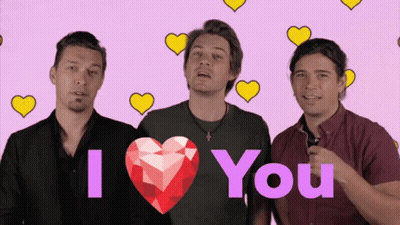 Three Men In Front Of Pink Background Saying I Love You GIF