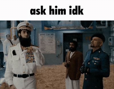 Three Men In Military Uniforms Are Standing In A Room With The Words Ask Him Idk Written Above Them GIF