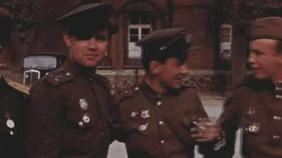 Three Men in Military Uniforms With Hat Letter O