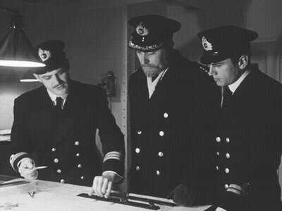 three men in military uniforms with the number 16 on their sleeve