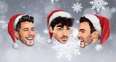 Three Men In Santa Hats With Snowflakes GIF